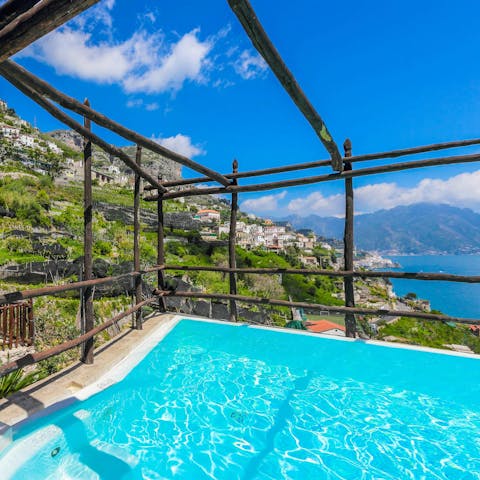 Cool down in the private pool overlooking the bay