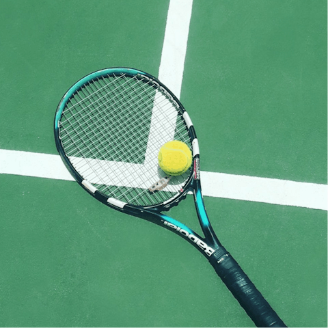 Challenge your guests to a round of tennis on the all-weather court