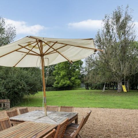 Let the children run off some stream in the play area as you fire up the Weber barbecue