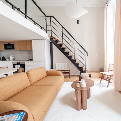 Kick back in the bright living area after sightseeing around Paris