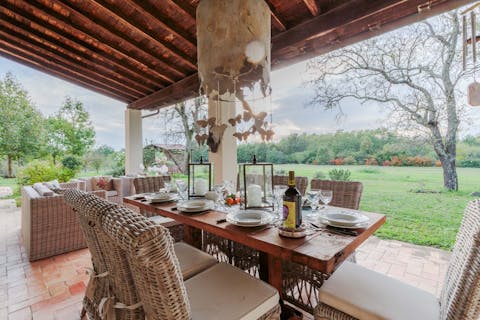 Dine on the terrace and take in the views of the garden and surrounding woods