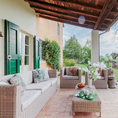 Sip cocktails on the veranda as the sun is setting