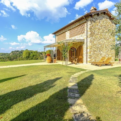 Fall in love with the beauty of Tuscany from this traditional home in the hills