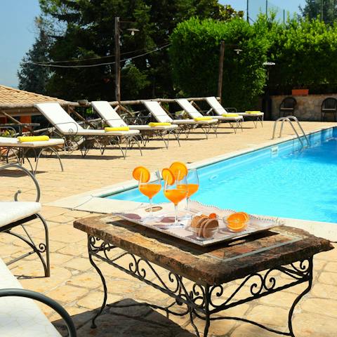 Shake a cocktail or two by the pool