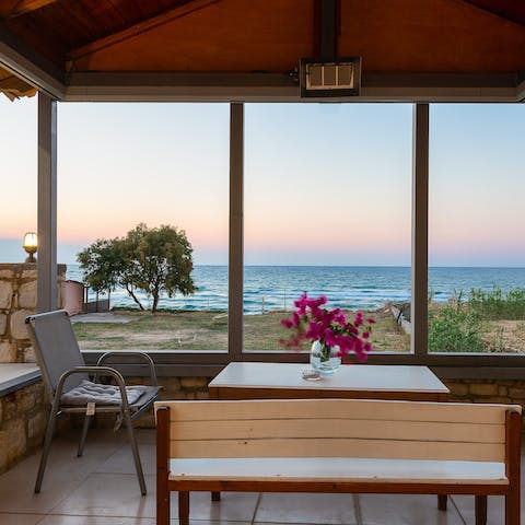 Pour a glass of wine and enjoy the stunning sunset from your terrace