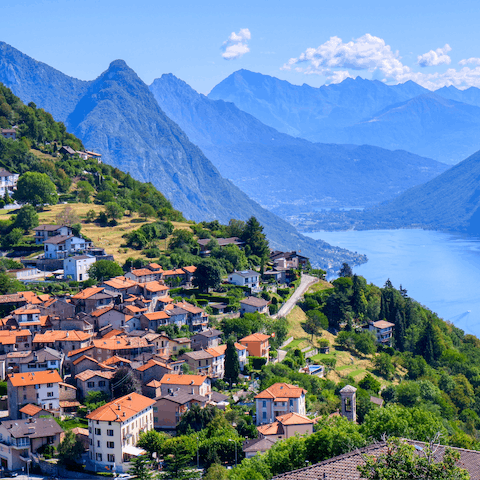 Stay in the picturesque town of Lugano, surrounded by mountains and a twenty-minute walk away from the stunning lake