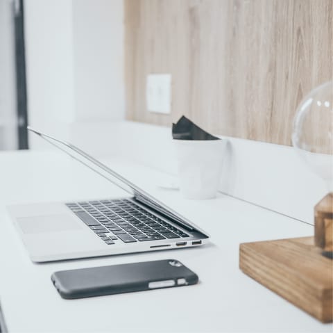 Catch up on work in the communal coworking space