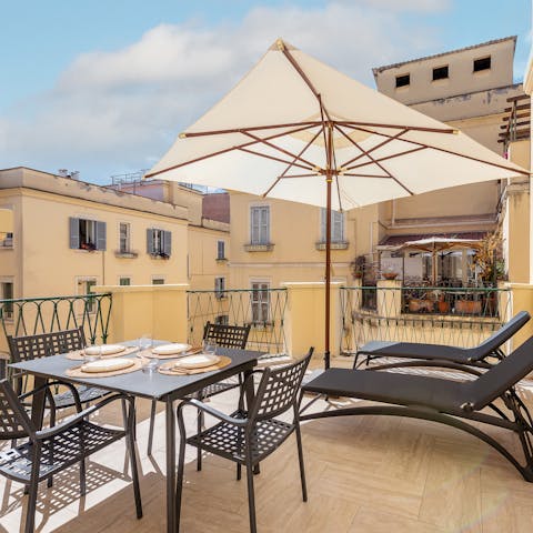 Take a break from sightseeing and enjoy a glass of wine on the terrace