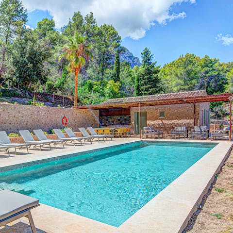 Settle in for a day by the pool