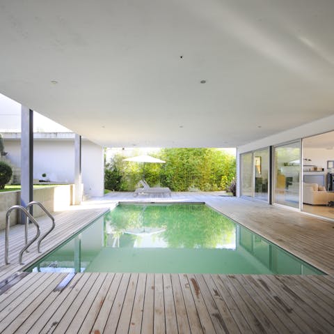 Relax in the indoor-outdoor pool courtyard
