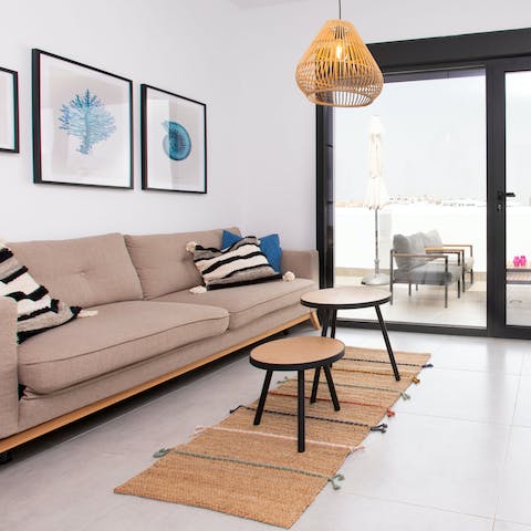 Kick back and unwind in the bright living room with your favourite Netflix show