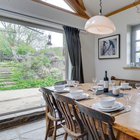 Celebrate the atmospheric beauty of this home with gatherings around the table