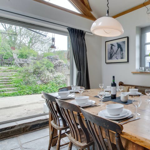 Celebrate the atmospheric beauty of this home with gatherings around the table