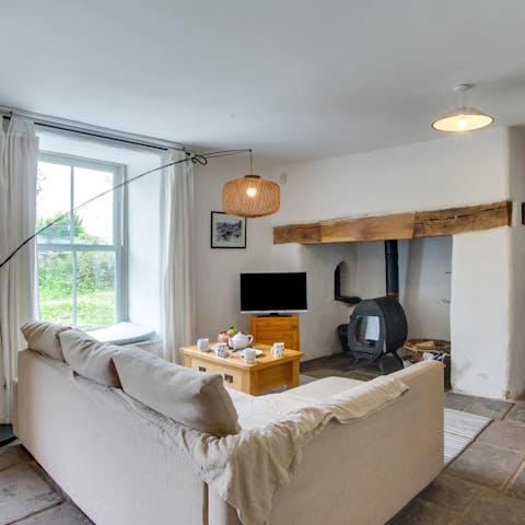 Enjoy a warm welcome from the cosy charm of the living room