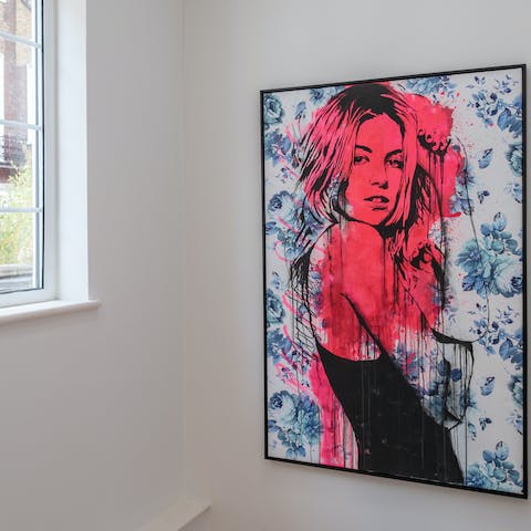 Admire the eye-catching artworks dotted throughout the home