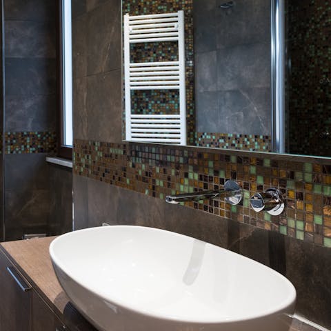The sleek ensuite bathroom