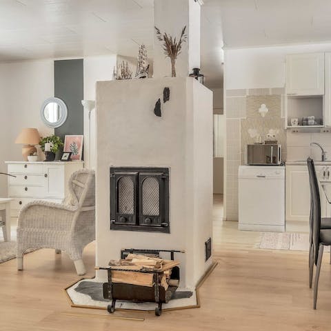 Relax by the cosy fireplace after a hiking trip