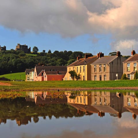 Grab your bike and cycle to charming Llansteffan, four miles away