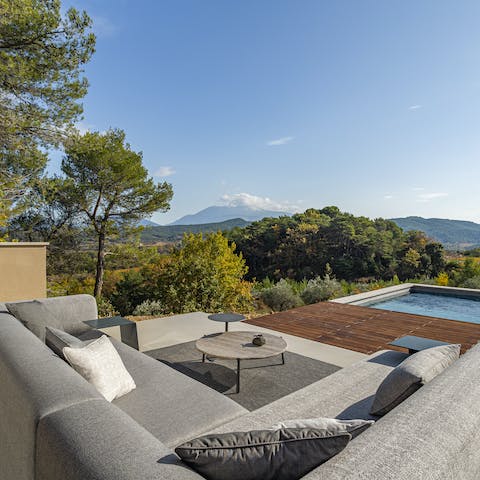 Sip a glass of bubbly and watch the sun set over the landscape