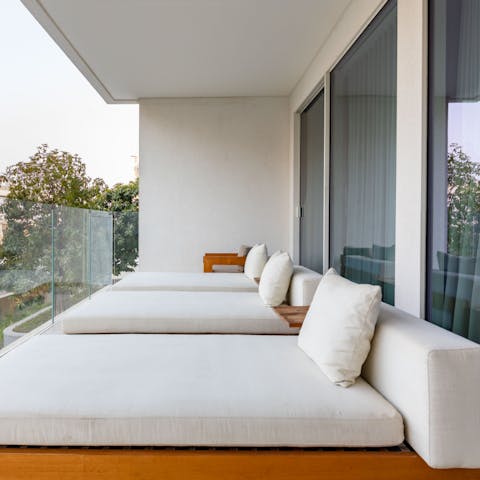 Lounge on the day beds after an afternoon of shopping at Dubai Mall