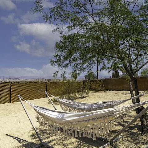 Sunbathe or stargaze in the hammocks