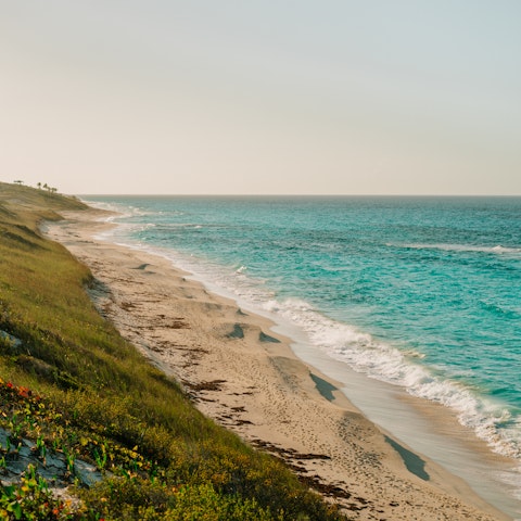 Head down to the two-mile stretch of white-sand beach that lies oppostite the home
