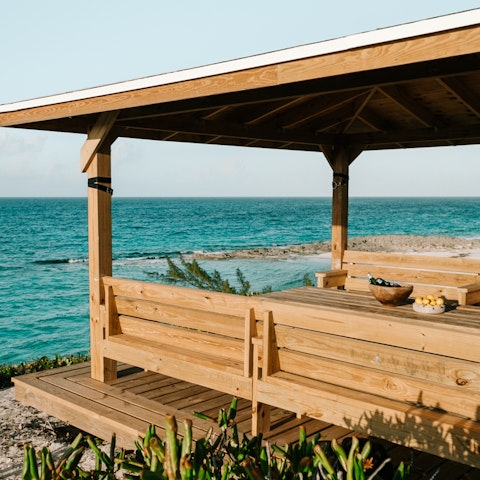 Enjoy cocktails on the deck with the sound of the lapping Atlantic Ocean to accompany you