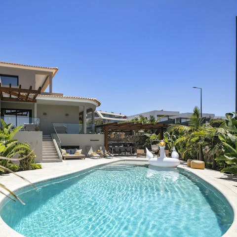 Dive into the private pool to cool off