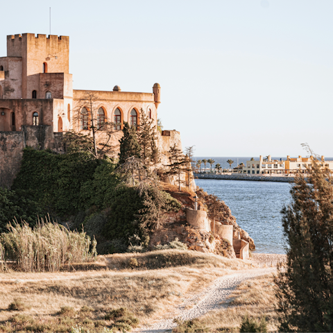 Stroll the steep cobbled streets of Ferragudo – the main square is a short walk away
