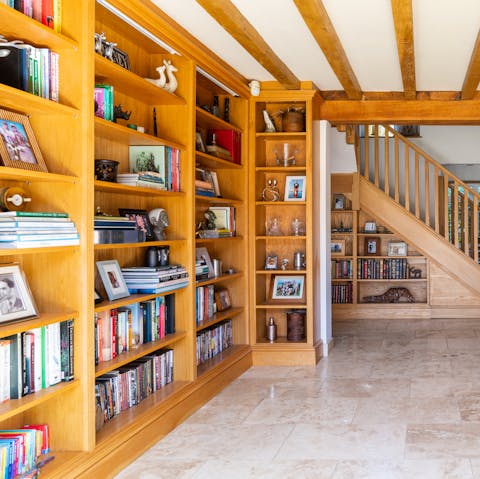 Choose from a collection of books and games in the library alcove