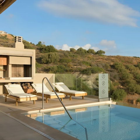 Relax in the sun before cooling off in the private pool