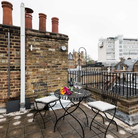 Enjoy sunset drinks on the large private roof terrace