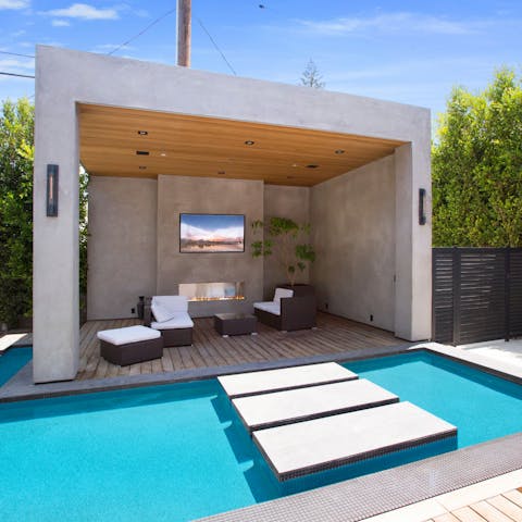 Enjoy total relaxation while lounging by the pool