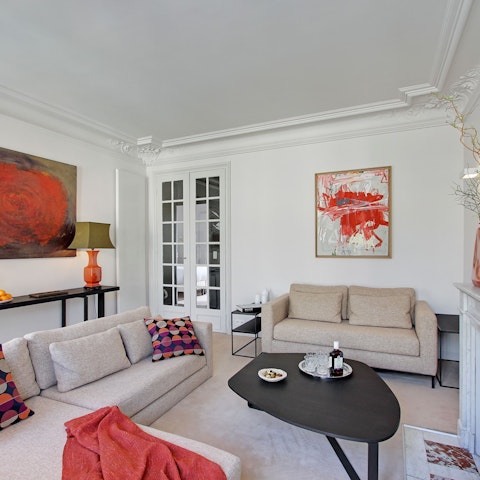 Relax on the comfy sofa after exploring Paris