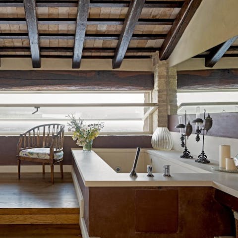 Unwind after a day of exploring the unspoilt town in the bathtub