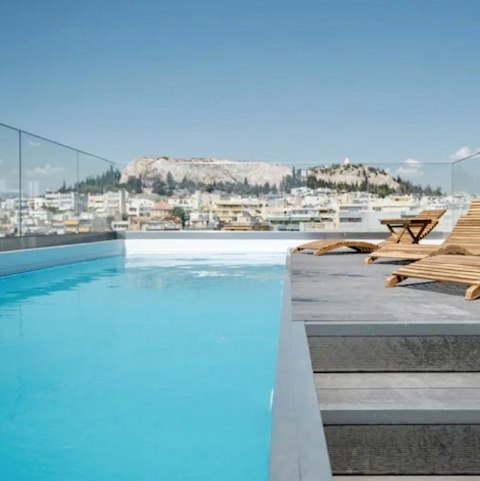 Start your day with a dip in the shared rooftop pool
