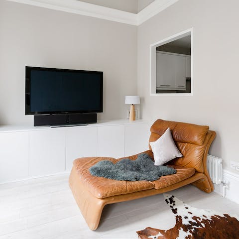 Lounge on the stylish sofas