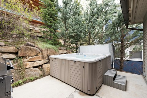 Soak away tired legs in the private hot tub