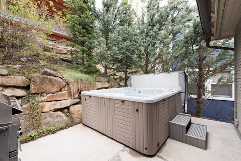 Soak away tired legs in the private hot tub