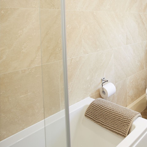 Unwind with a soak in the tub after a day on your feet