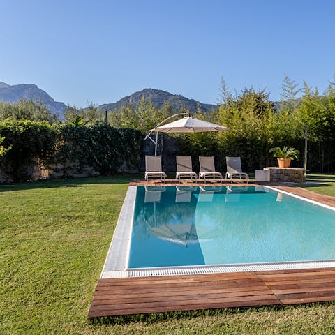 Wake up to mountain views and spend a day by the pool