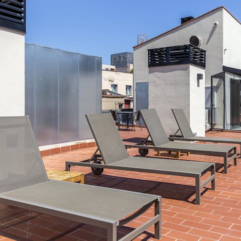 Take your morning espresso up to the communal roof terrace