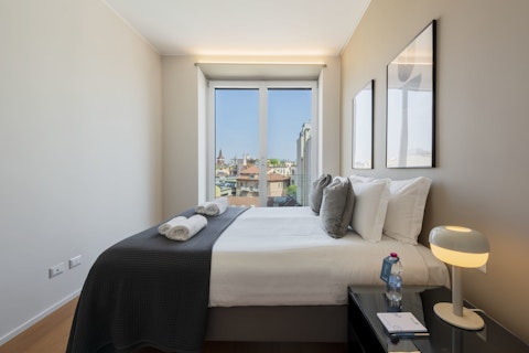 Wake to rooftop views across the Milan skyline