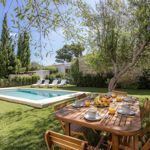 Enjoy breakfast alfresco, shaded by olive trees