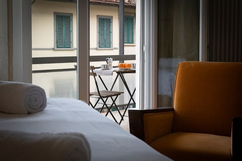Step out onto your private balcony for a slow Florentine morning
