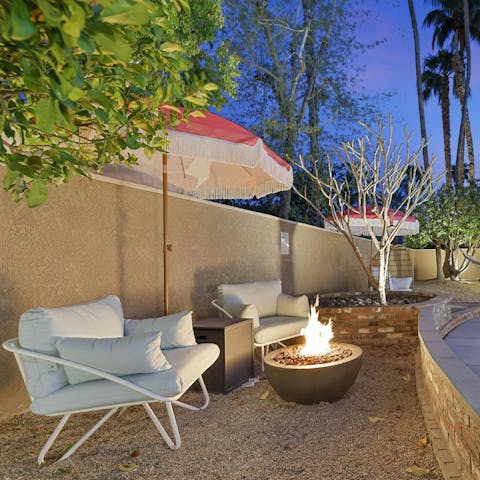 Savour magical evening drinks around the fire pit