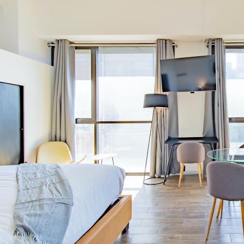 Wake up to sunshine from large windows