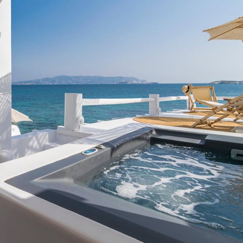Soak in the hot tub with a staggeringly beautiful backdrop