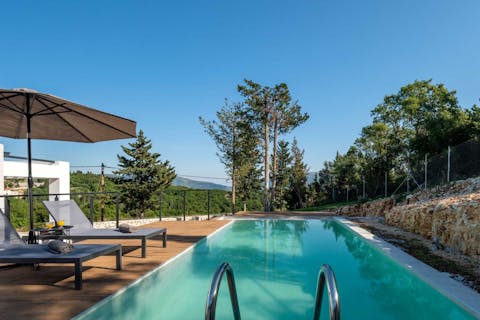 Swim in the private pool to cool off in the Greek heat