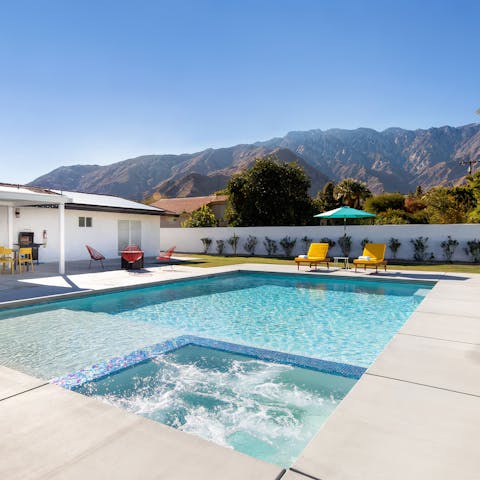 Swim in the crystalline waters of the pool, keeping an eye on the beautiful view